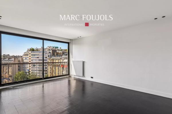Paris XVI Passy : appartement en étale élevé avec balcons et vue dégagée