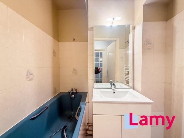 Appartement + cave + stationnement