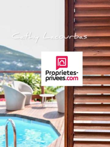 Villa comprenant 5 appartements, vue mer exceptionnelle-Bouillante