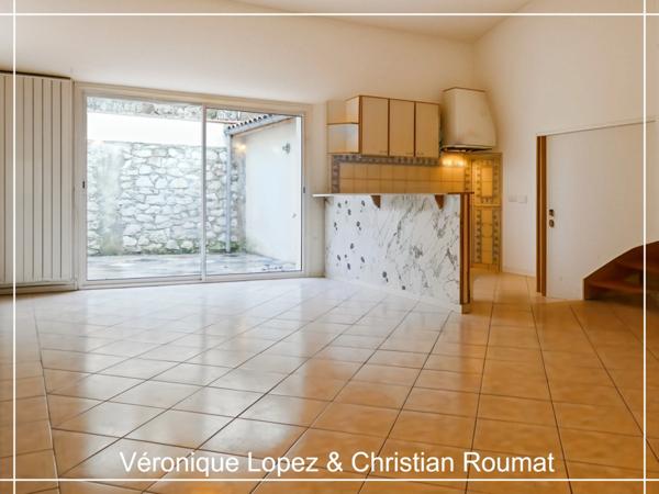 Bon-Encontre, maison mitoyenne de 106 m² habitables avec 3 chambres, cour, garage, parking