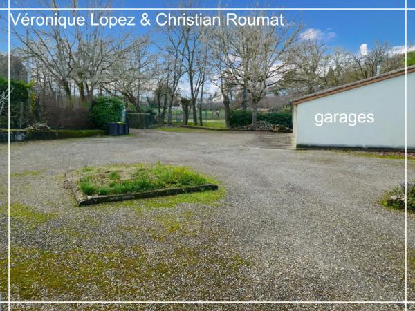 Bon-Encontre, maison mitoyenne de 106 m² habitables avec 3 chambres, cour, garage, parking