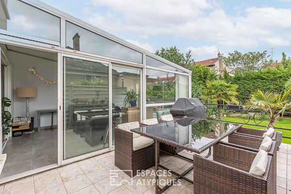Maison années 50 avec jardin et double garage