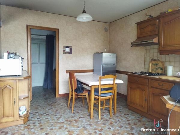 Ensemble immobilier en pierres à Andouillé
