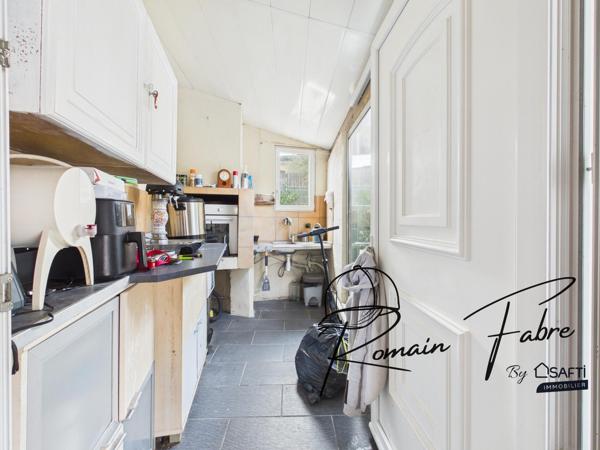 Maison en pierre avec 3 chambres centre ville de Cavignac