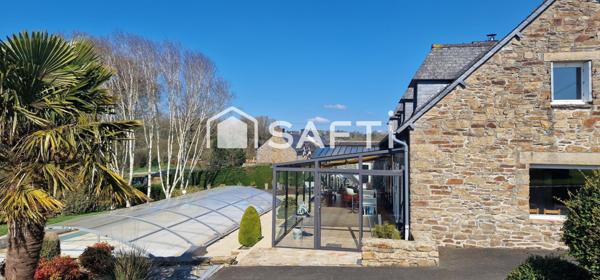 Grande longère avec vie de plain pied et piscine.