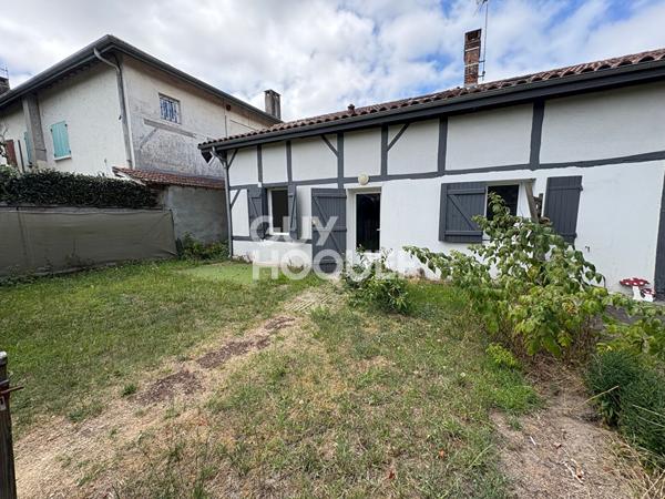 Maison landaise mitoyenne d'environ 100 m² avec jardin