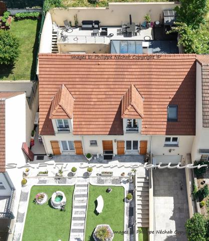 Maison contemporaine 164m2 - 5 chambres - dont un studio T2 indépendant – garage – véranda.