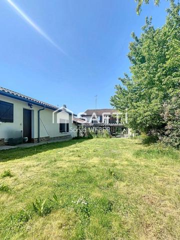 Petite ferme avec belle véranda, jardin et garage