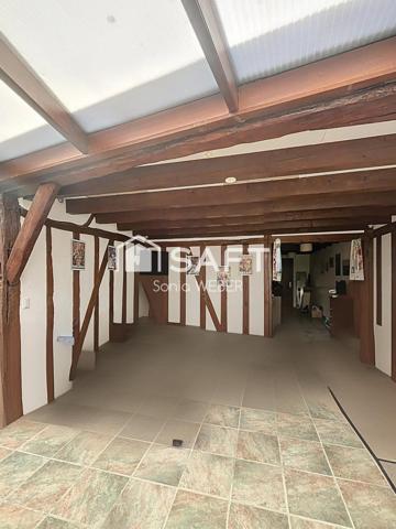 Petite ferme avec belle véranda, jardin et garage