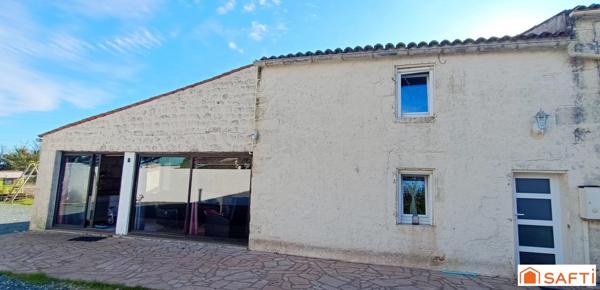 Maison en pierre avec garage