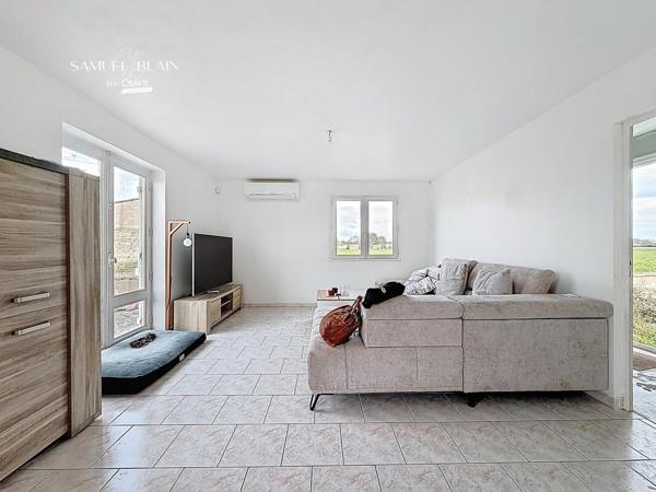 Deux maisons+Hangar+garage+terrain clos de 3300 m2.