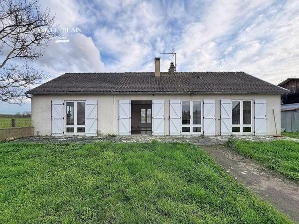 Deux maisons+Hangar+garage+terrain clos de 3300 m2.