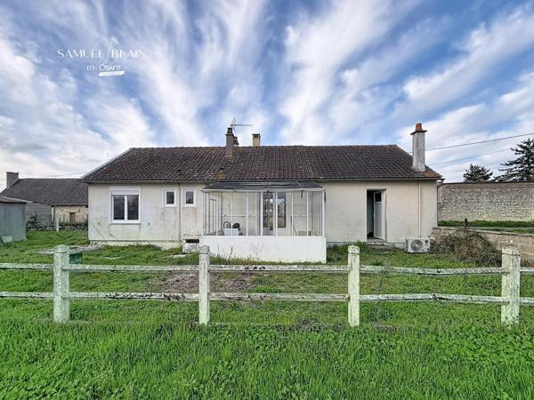 Deux maisons+Hangar+garage+terrain clos de 3300 m2.