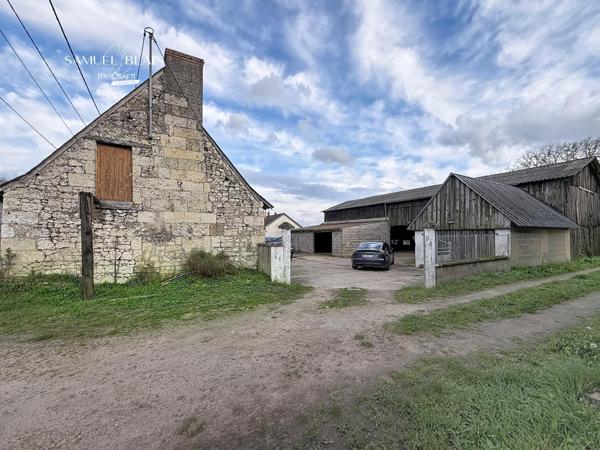 Deux maisons+Hangar+garage+terrain clos de 3300 m2.