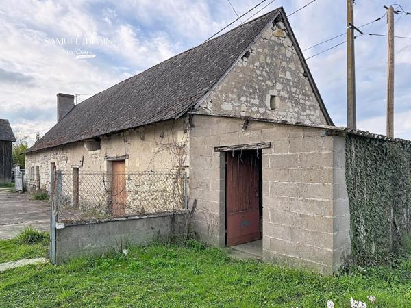 Deux maisons+Hangar+garage+terrain clos de 3300 m2.