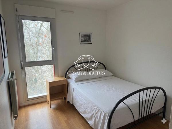 Appartement T3 de 62,83 m² avec séjour en rotonde et parking privé, idéalement situé au cœur du 6e arrondissement de Lyon, étage élevé.