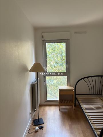 Appartement T3 de 62,83 m² avec séjour en rotonde et parking privé, idéalement situé au cœur du 6e arrondissement de Lyon, étage élevé.