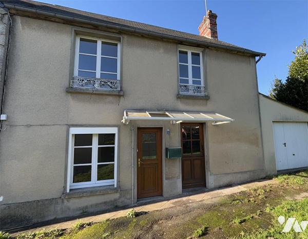 Maison de 73 m2 en centre ville avec un terrain de 318 m2 et un garage