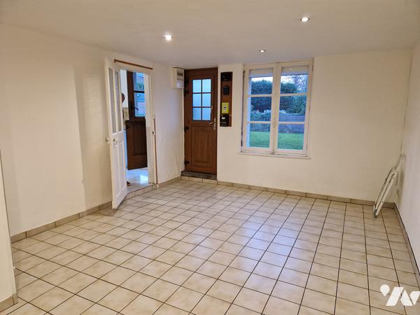 Maison de 73 m2 en centre ville avec un terrain de 318 m2 et un garage