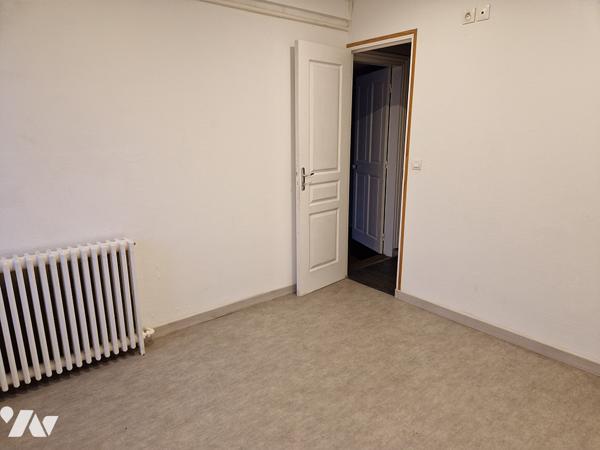 Maison de 73 m2 en centre ville avec un terrain de 318 m2 et un garage