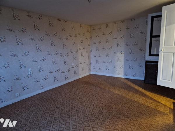 Maison de 73 m2 en centre ville avec un terrain de 318 m2 et un garage