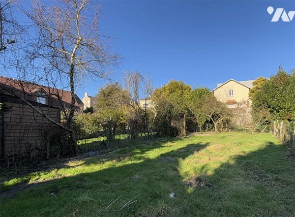 Maison de 73 m2 en centre ville avec un terrain de 318 m2 et un garage