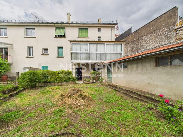 A vendre a Arpajon Sur Cere, Maison de ville 6 piece avec cave, garage et jardin, a renover