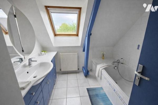 Maison à vendre à Theix‑Noyalo (56450) – 161 m² habitables, 4 chambres, terrain de 1 113 m², garage 