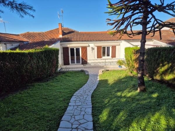 Maison en pierre sur sous-sol, jardin, 2 chambres, proximité transports et commerces