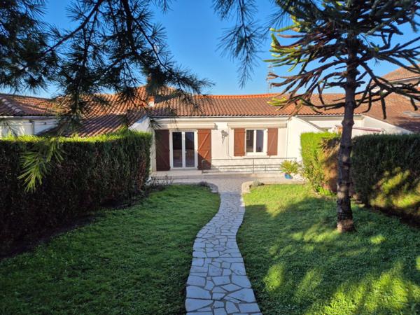 Maison en pierre sur sous-sol, jardin, 2 chambres, proximité transports et commerces