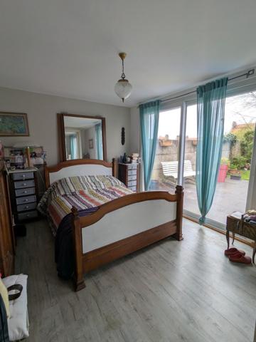 Appartement spacieux avec jardin et garage