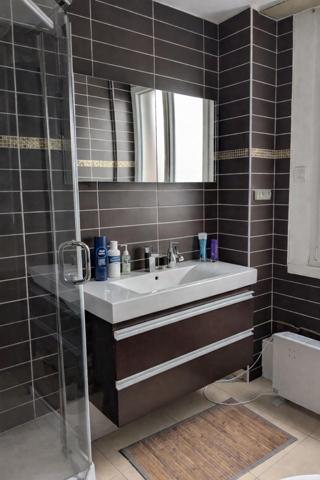 Appartement spacieux avec jardin et garage