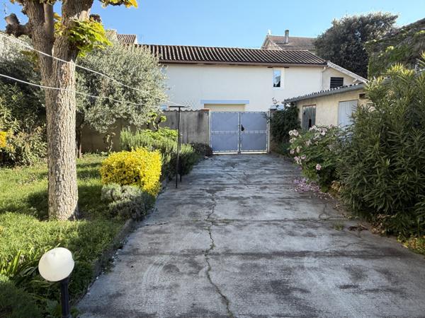 Villeneuve-sur-Lot (47300) Villeneuve sur lot, maison de ville de plain-pied avec garage et jardin