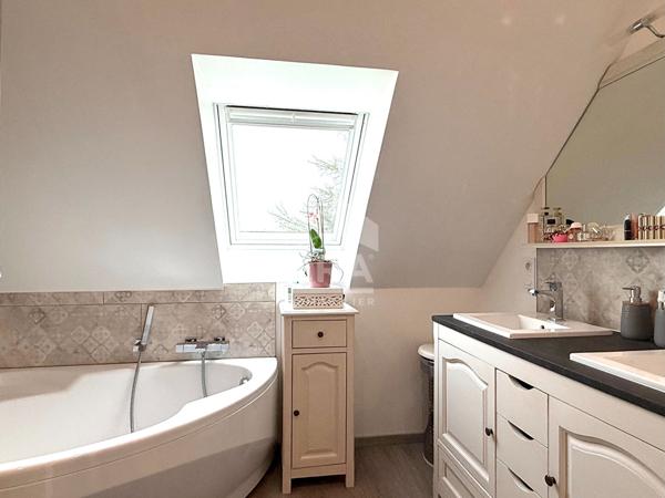 Maison individuelle 3 chambres - Véranda - Sous-sol complet - Jardin