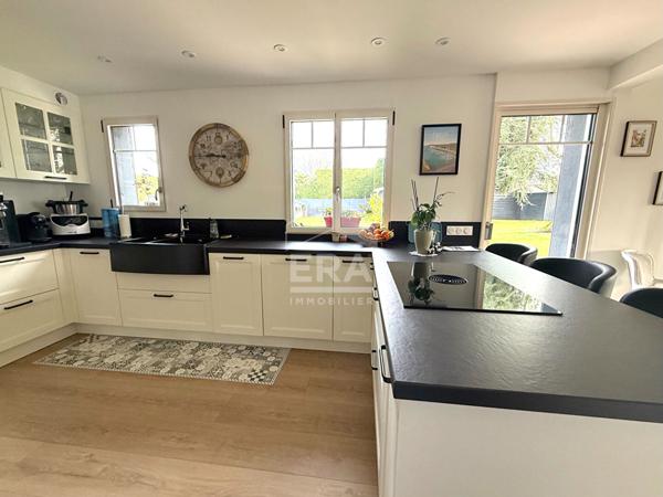 Maison individuelle 3 chambres - Véranda - Sous-sol complet - Jardin