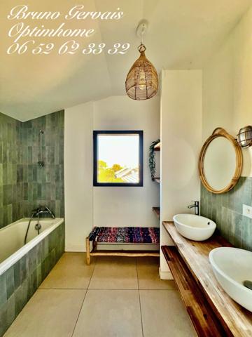 VILLA CONTEMPORAINE A OSSATURE BOIS D'INSPIRATION WEST COAST A VENDRE A FRONTIGNAN