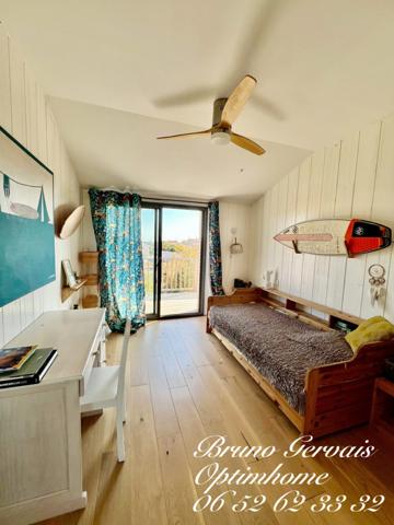 VILLA CONTEMPORAINE A OSSATURE BOIS D'INSPIRATION WEST COAST A VENDRE A FRONTIGNAN