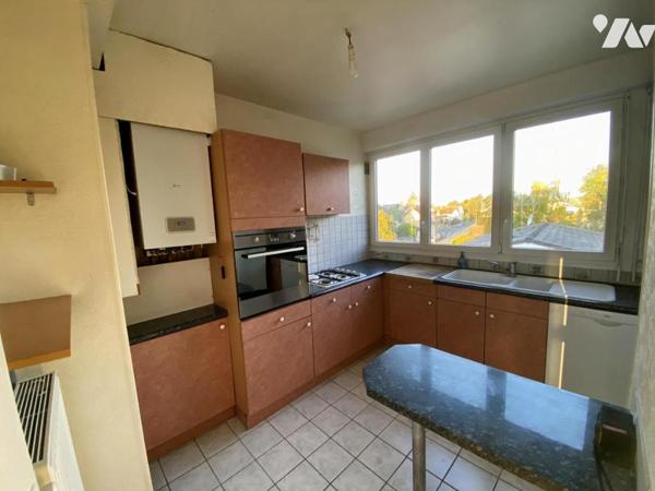 TINQUEUX / APPARTEMENT DE TYPE 3/4 / GARAGE