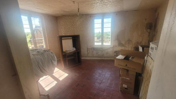 Immeuble avec ancien commerce et logement indépendant