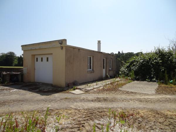 Saint-Nicolas-du-Pélem (22480) Maison de campagne avec dépendances et sous-sol complet à aménager