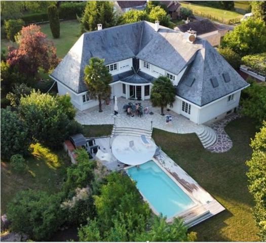 Villa située dans un secteur verdoyant très recherché