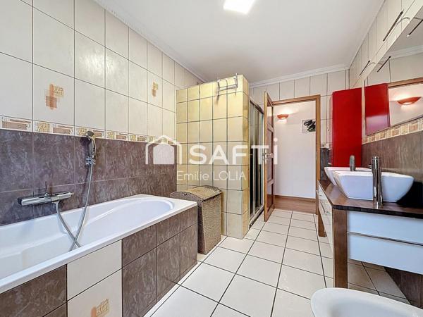 Maison individuelle de 130 m² – 4 chambres – Plain-pied surélevé