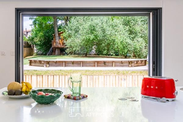 Appartement atypique avec jardin et piscine privée