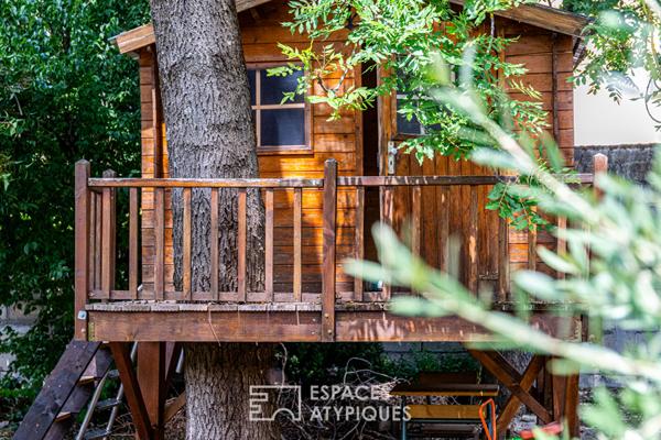 Appartement atypique avec jardin et piscine privée