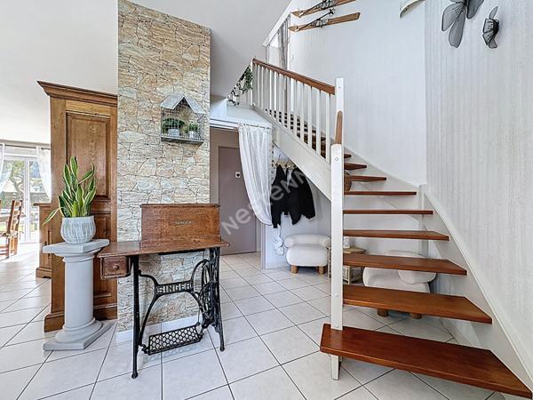 Maison familiale à vendre à Ancenis - 4 chambres, jardin et garage.