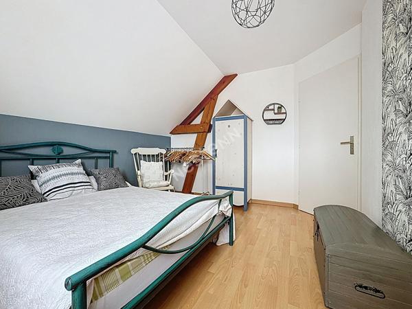 Maison familiale à vendre à Ancenis - 4 chambres, jardin et garage.