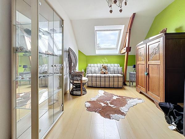 Maison familiale à vendre à Ancenis - 4 chambres, jardin et garage.