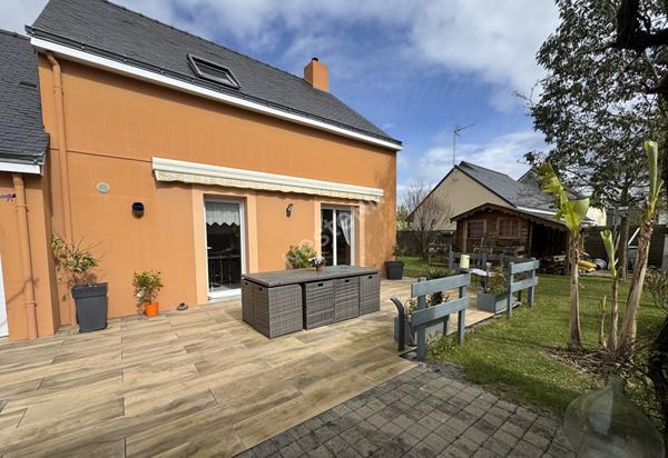 Maison familiale à vendre à Ancenis - 4 chambres, jardin et garage.