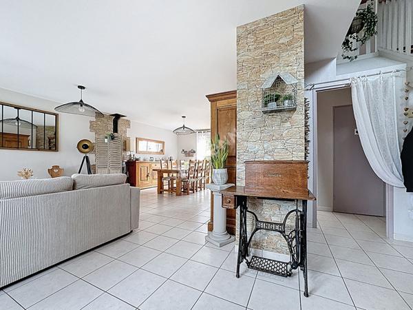 Maison familiale à vendre à Ancenis - 4 chambres, jardin et garage.