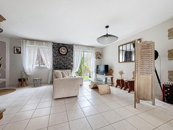 Maison familiale à vendre à Ancenis - 4 chambres, jardin et garage.